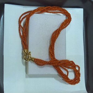 Torcion corallo giapponese e susta in oro 18k