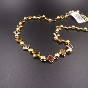 Collana diamantini e topazio idrotermale