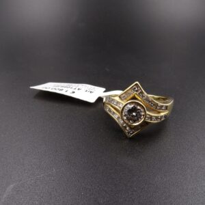 Anello rombo diam. centrale 0.65ct + baguette laterali 1.00 ct